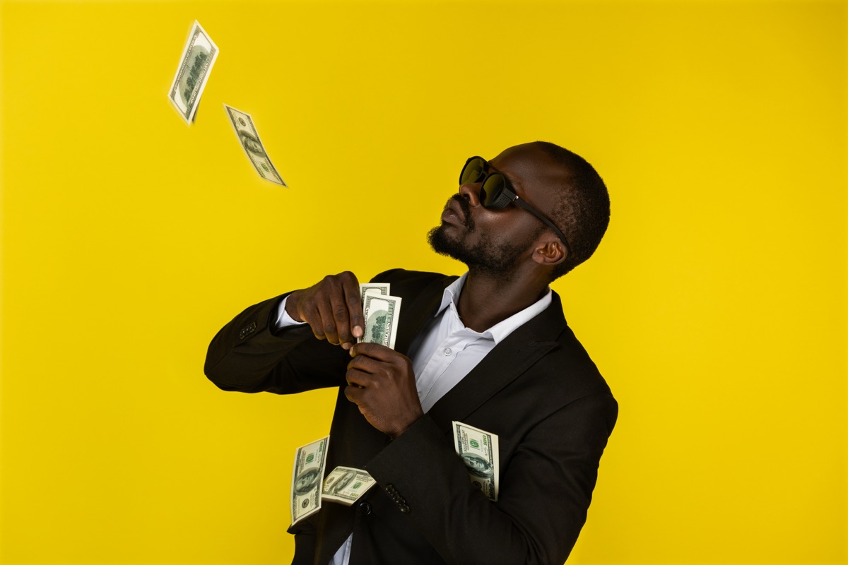 Money being thrown — wasted budget